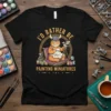 I'd Rather Be Painting Miniatures T-Shirt with a cat wearing a Viking helmet painting a dragon miniature