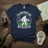 I'd Rather Be Squatchin' Go Explore t-shirt with Bigfoot graphic and mountain scene