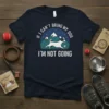 If I Can't Bring My Dog I'm Not Going t-shirt with a dog running in front of mountains