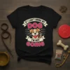 If I Can't Bring My Dog I'm Not Going quote with cute cartoon dog graphic on a black t-shirt