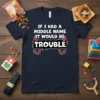 Navy t-shirt with white text "IF I HAD A MIDDLE NAME IT WOULD BE TROUBLE" and devil horns graphic, primary
