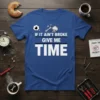 If It Ain't Broke Give Me Time quote on a blue t-shirt with cartoon bomb and wrench graphic