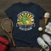 Funny pickleball t-shirt with a muscular pickle character holding a tennis racket and the text "If You Are Looking For