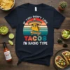 T-shirt with "If You Don't Like Tacos I'm Nacho Type" quote, featuring a cartoon taco on a skateboard