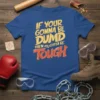 Blue t-shirt with yellow and orange text that reads "IF YOUR GONNA BE DUMB THEN YOU GOTTA BE TOUGH" for