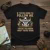 ATV rider t-shirt with text "IF YOU'RE GOING TO FOLLOW ME YOU BETTER KNOW WHAT YOU'RE DOING" and graphic of