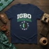 Igbo Nigeria text graphic with cultural symbols, featuring white and green lettering on a navy t-shirt