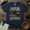 I'LL PUT YOU IN THE TRUNK DON'T TEST ME! humorous cat t-shirt design with a black cat in a car