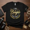 Black t-shirt with gold text reading "I'M Boujee AND I KNOW IT!" surrounded by crowns and diamonds