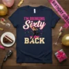 I'm Bringing Sixty Back text with dancing woman graphic on a navy t-shirt, celebrating a 60th birthday
