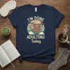 I'm Done Adulting Today text with a cute sloth hanging on a branch on a navy t-shirt
