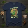 I'm Done Dillin' WITH YOU funny pickle t-shirt with a cartoon pickle wearing sunglasses and cowboy boots