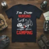 I'm Done Nursing Let's Go Camping T-Shirt design featuring a nurse transitioning to camping life with mountains and a camper