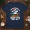 I'm Dreaming of a Great White Christmas shark wearing Santa hat with gingerbread and gifts graphic