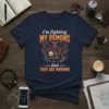 I'm fighting MY DEMONS and THEY ARE WINNING text with a devil hugging a possum graphic on a navy t-shirt