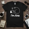 Black t-shirt with white text "i'm fine" and a sleeping cat graphic, representing the primary keyword