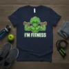 I'm Fitness t-shirt with a muscular cartoon broccoli character lifting dumbbells, bold green and white text