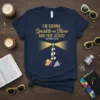 Navy blue t-shirt with gold glitter text "I'm Gonna Sparkle and Shine and For Jesus!" and lighthouse graphic, Matthew 5:14-16