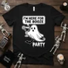 Black t-shirt with white text "I'm Here For The Booze Party" and a ghost holding a cocktail