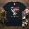 Black t-shirt with bold white and red text: "I'M ITALIAN WE DON'T CALL THE COPS" and green text "We Call