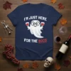 I'm Just Here For The Boos t-shirt with a cute ghost holding wine glasses, perfect for Halloween and wine lovers