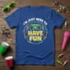 I'm Just Here To Have Fun quote with retro boombox and dancing figures on a blue t-shirt design