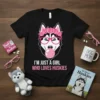Black t-shirt with pink text "I'm Just A Girl Who Loves Huskies" and a graphic of a husky wearing a