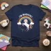 Navy t-shirt with white text "I'M MAGICAL!" encircling a white unicorn on a rainbow with clouds and stars