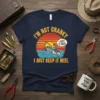 Fishing t-shirt with "I'm Not Cranky I Just Keep It Reel" text and a graphic of a fisherman in a