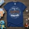 Navy blue t-shirt with white and leopard print text: "I'm Not Just the Auntie I'm the Crazy Godmother" surrounded by