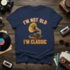 Navy t-shirt with "I'm Not Old I'm Classic" text and a vintage gramophone graphic
