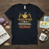 T-shirt with text "I'm Not Retired I'm A Professional Memaw" and a cute teapot graphic, designed for grandmothers