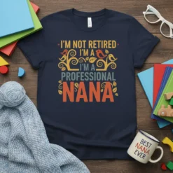I'm Not Retired I'm A Professional Nana t-shirt with vintage birds and tree graphic. Features bold orange and yellow text