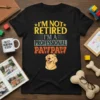 I'm Not Retired I'm A Professional Pawpaw t-shirt design with golden retriever wearing a crown. Features distressed typography