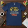 I'm Not Retired I'm A Professional Tata T-Shirt with distressed yellow and orange text