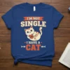 Blue t-shirt with "I'm Not Single I Have A Cat" text and a cute cartoon cat holding a heart