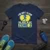 Runner graphic with text "I'm Not Slow I'm Just In My Zone 2" on a navy blue t-shirt, motivational fitness