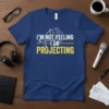 I'm Not Yelling I Am Projecting quote t-shirt with megaphone graphic in white and yellow text