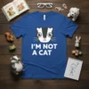 I'm Not A Cat t-shirt design featuring a cute cartoon skunk face and bold white text "I'm Not A Cat"