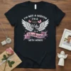 I'm Not a Widow I'm a Wife to a Husband with Wings t-shirt design with white wings and pink butterflies