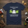 Navy t-shirt with white text "I'm Not In Bad Mood Mood I Have Multiple Personalities" above three cartoon frogs, two