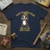 T-shirt featuring a badger holding a stool with the text "I'm Not The Bigger Person I Will Hit You With