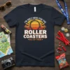I'm Only Here For The Roller Coasters All Of Them text design with roller coaster graphic, sunset, and stars on