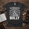 I'm Protected By The Good Lord And My Bully t-shirt design featuring an angel pit bull with wings and halo