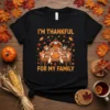 I'm Thankful For My Family Thanksgiving t-shirt with a turkey and masked animals at a dinner table