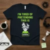 I'm Tired of Pretending This Is Normal quote t-shirt with cartoon illustration of a stressed person and broken houses on