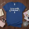 I'm too pretty to do math quote with makeup brushes and lipstick graphic on a blue t-shirt