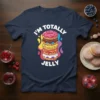T-shirt with the text "I'm TOTALLY JELLY" stacked with colorful donuts in a playful design
