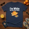 Navy t-shirt with white text "I'm White But Not That White" and a graphic of a peeled orange with a