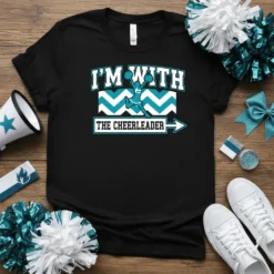 Black t-shirt with "I'm With The Cheerleader" text and a graphic of a cheerleader mid-jump